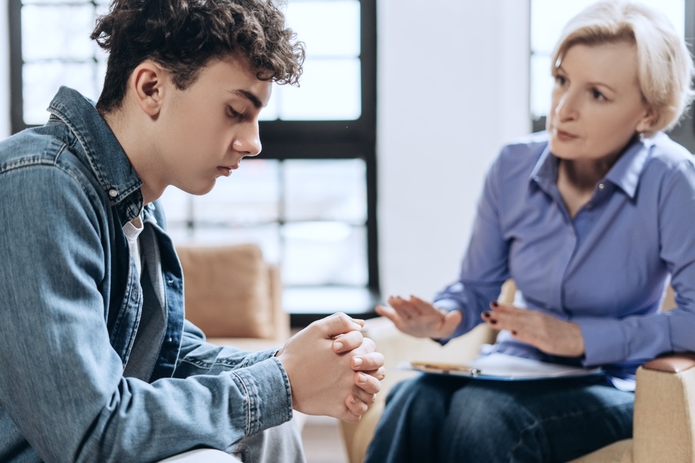 Young man during teen mental health treatment center in Commerce