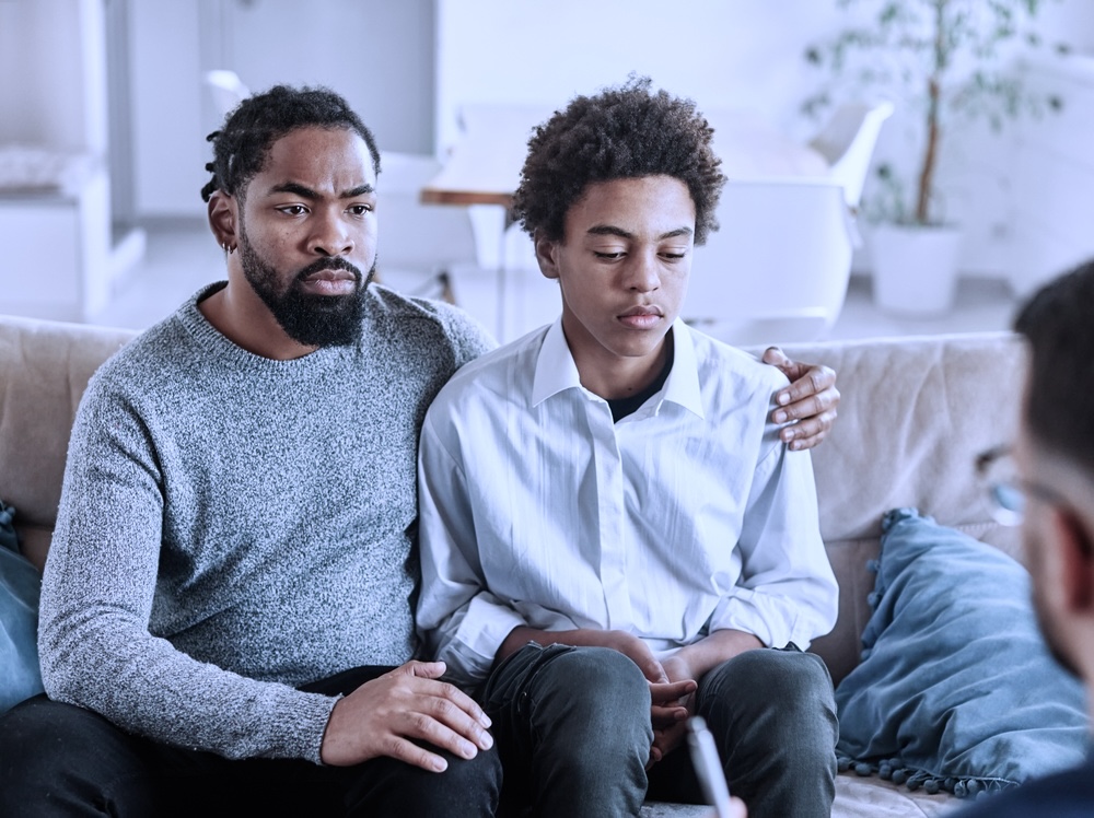 Parent and teen in a mental health treatment center