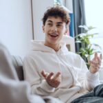 Smiling teen during teen mental health treatment